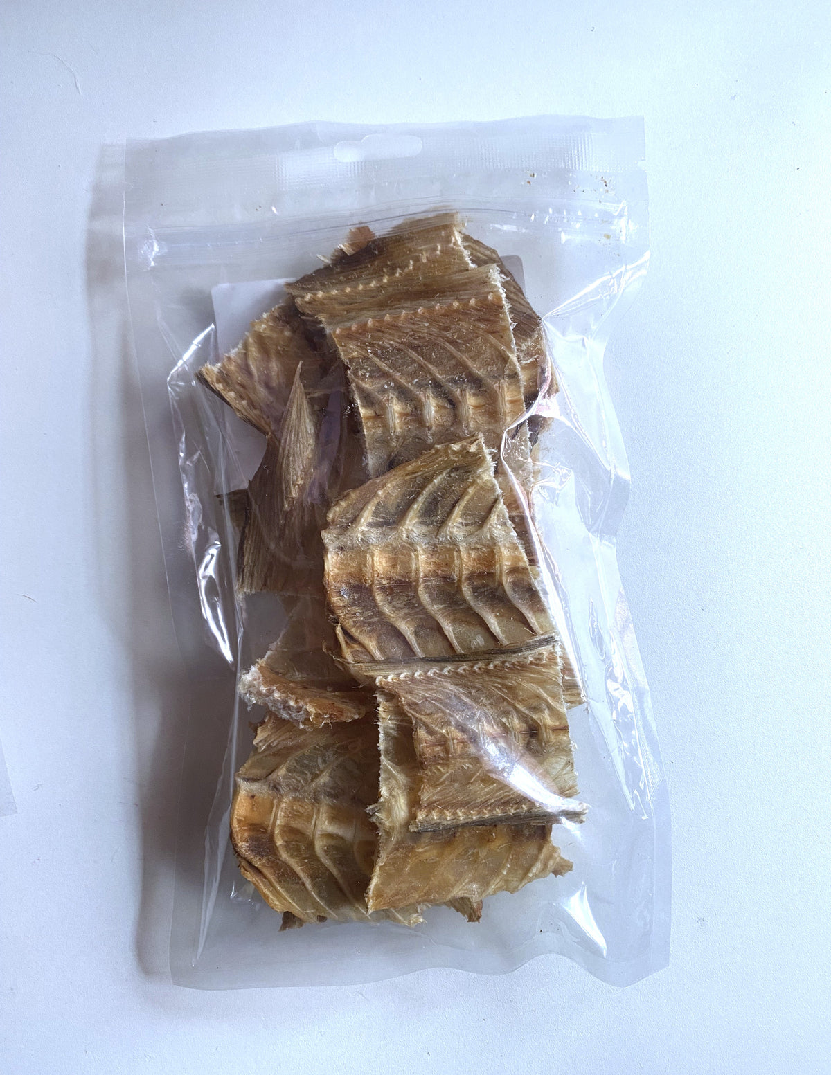 TROZOS DE PESCADO Peso: 70 GRMS.