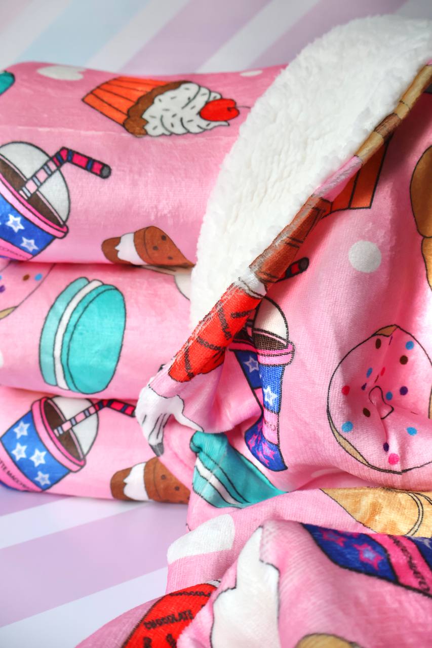 Manta Dulces Deseos. Abrigaros al calor del precioso diseño de nuestra manta más rosita.