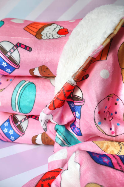 Manta Dulces Deseos. Abrigaros al calor del precioso diseño de nuestra manta más rosita.